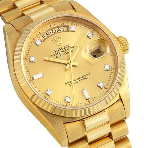 rolex day date gold